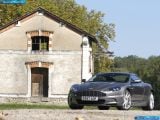 Ð“Ð°Ð»ÐµÑ€ÐµÑ Ñ„Ð¾Ñ‚Ð¾Ð³Ñ€Ð°Ñ„Ð¸Ð¹ Ð¸ Ð¾Ð±Ð¾ÐµÐ² Ñ€Ð°Ð±Ð¾Ñ‡ÐµÐ³Ð¾ ÑÑ‚Ð¾Ð»Ð° Ñ Ð¸Ð·Ð¾Ð±Ñ€Ð°Ð¶ÐµÐ½Ð¸ÐµÐ¼ ÑÐºÑÑ‚ÐµÑ€ÑŒÐµÑ€Ð°, Ð¸Ð½Ñ‚ÐµÑ€ÑŒÐµÑ€Ð°, ÐºÐ¾Ð½ÑÑ‚Ñ€ÑƒÐºÑ†Ð¸Ð¸ Ð¸ Ð´Ð¸Ð·Ð°Ð¹Ð½ÐµÑ€ÑÐºÐ¸Ñ… Ñ€Ð¸ÑÑƒÐ½ÐºÐ¾Ð² Ð°Ð²Ñ‚Ð¾Ð¼Ð¾Ð±Ð¸Ð»Ñ 2007 Aston Martin DBS.
