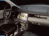Ð“Ð°Ð»ÐµÑ€ÐµÑ Ñ„Ð¾Ñ‚Ð¾Ð³Ñ€Ð°Ñ„Ð¸Ð¹ Ð¸ Ð¾Ð±Ð¾ÐµÐ² Ñ€Ð°Ð±Ð¾Ñ‡ÐµÐ³Ð¾ ÑÑ‚Ð¾Ð»Ð° Ñ Ð¸Ð·Ð¾Ð±Ñ€Ð°Ð¶ÐµÐ½Ð¸ÐµÐ¼ ÑÐºÑÑ‚ÐµÑ€ÑŒÐµÑ€Ð°, Ð¸Ð½Ñ‚ÐµÑ€ÑŒÐµÑ€Ð°, ÐºÐ¾Ð½ÑÑ‚Ñ€ÑƒÐºÑ†Ð¸Ð¸ Ð¸ Ð´Ð¸Ð·Ð°Ð¹Ð½ÐµÑ€ÑÐºÐ¸Ñ… Ñ€Ð¸ÑÑƒÐ½ÐºÐ¾Ð² Ð°Ð²Ñ‚Ð¾Ð¼Ð¾Ð±Ð¸Ð»Ñ 2003 Mazda 2.