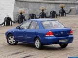 Ð“Ð°Ð»ÐµÑ€ÐµÑ Ñ„Ð¾Ñ‚Ð¾Ð³Ñ€Ð°Ñ„Ð¸Ð¹ Ð¸ Ð¾Ð±Ð¾ÐµÐ² Ñ€Ð°Ð±Ð¾Ñ‡ÐµÐ³Ð¾ ÑÑ‚Ð¾Ð»Ð° Ñ Ð¸Ð·Ð¾Ð±Ñ€Ð°Ð¶ÐµÐ½Ð¸ÐµÐ¼ ÑÐºÑÑ‚ÐµÑ€ÑŒÐµÑ€Ð°, Ð¸Ð½Ñ‚ÐµÑ€ÑŒÐµÑ€Ð°, ÐºÐ¾Ð½ÑÑ‚Ñ€ÑƒÐºÑ†Ð¸Ð¸ Ð¸ Ð´Ð¸Ð·Ð°Ð¹Ð½ÐµÑ€ÑÐºÐ¸Ñ… Ñ€Ð¸ÑÑƒÐ½ÐºÐ¾Ð² Ð°Ð²Ñ‚Ð¾Ð¼Ð¾Ð±Ð¸Ð»Ñ 2006 Nissan Almera Classic.