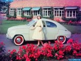 Ð“Ð°Ð»ÐµÑ€ÐµÑ Ñ„Ð¾Ñ‚Ð¾Ð³Ñ€Ð°Ñ„Ð¸Ð¹ Ð¸ Ð¾Ð±Ð¾ÐµÐ² Ñ€Ð°Ð±Ð¾Ñ‡ÐµÐ³Ð¾ ÑÑ‚Ð¾Ð»Ð° Ñ Ð¸Ð·Ð¾Ð±Ñ€Ð°Ð¶ÐµÐ½Ð¸ÐµÐ¼ ÑÐºÑÑ‚ÐµÑ€ÑŒÐµÑ€Ð°, Ð¸Ð½Ñ‚ÐµÑ€ÑŒÐµÑ€Ð°, ÐºÐ¾Ð½ÑÑ‚Ñ€ÑƒÐºÑ†Ð¸Ð¸ Ð¸ Ð´Ð¸Ð·Ð°Ð¹Ð½ÐµÑ€ÑÐºÐ¸Ñ… Ñ€Ð¸ÑÑƒÐ½ÐºÐ¾Ð² Ð°Ð²Ñ‚Ð¾Ð¼Ð¾Ð±Ð¸Ð»Ñ 1959 Saab 93.